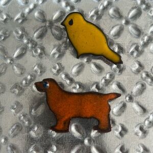 Vintage Enamel Brooches both for one price.